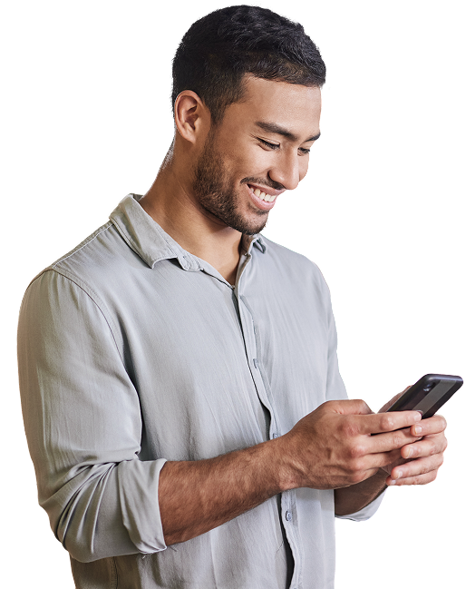 Portrait of young man looking at his cell phone